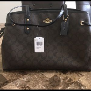 Brand new tag attached Brown Coach Purse